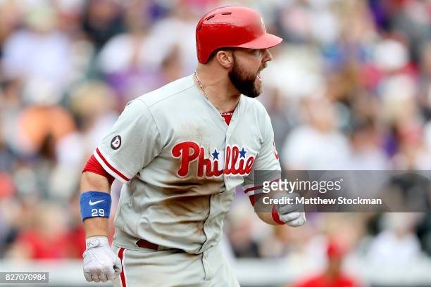 Cameron Rupp of the Philadelphia Phillies hits a 2 RBI double in the ninth inning against the Colorado Rockies at Coors Field on August 6, 2017 in...