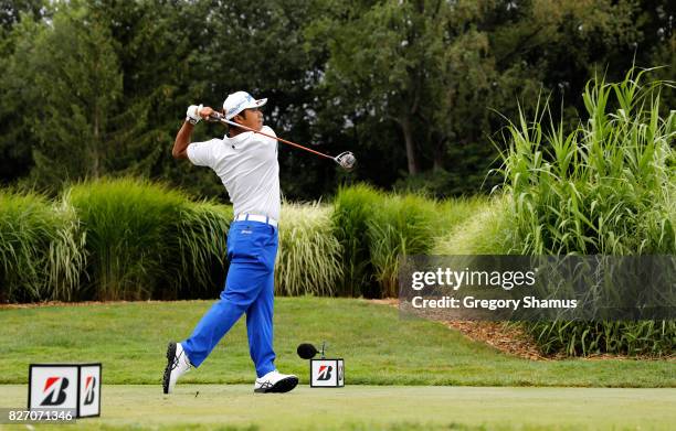 Hideki Matsuyama of Japan hits off the 16th tee during the final round of the World Golf Championships - Bridgestone Invitational at Firestone...