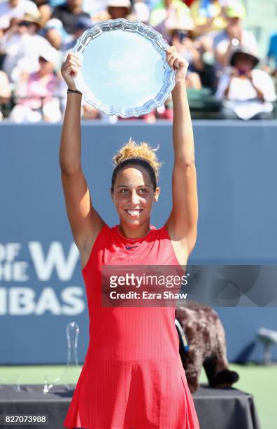 Madison Keys holds up the trophy after beating CoCo Vandeweghe in the finals on Day 7 of the Bank of the West Classic at Stanford University Taube...