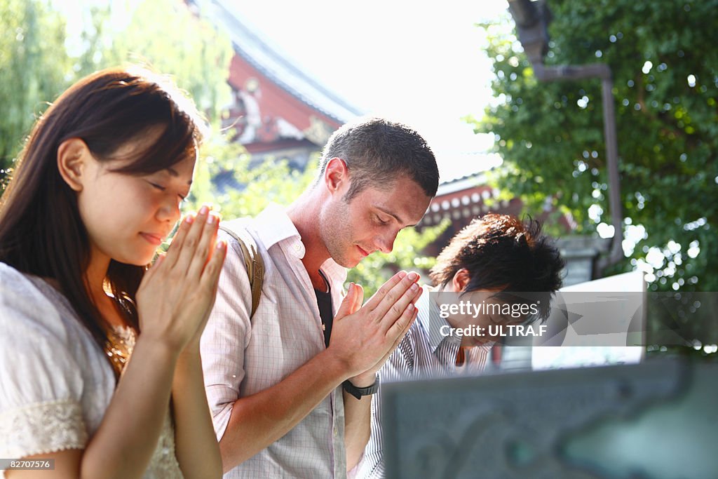 Young people are hanging around Senso-Ji temple.