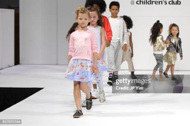 Young models walk the runway during the finale of petitePARADE at Children's Club at Jacob Javitz Center on August 6, 2017 in New York City.