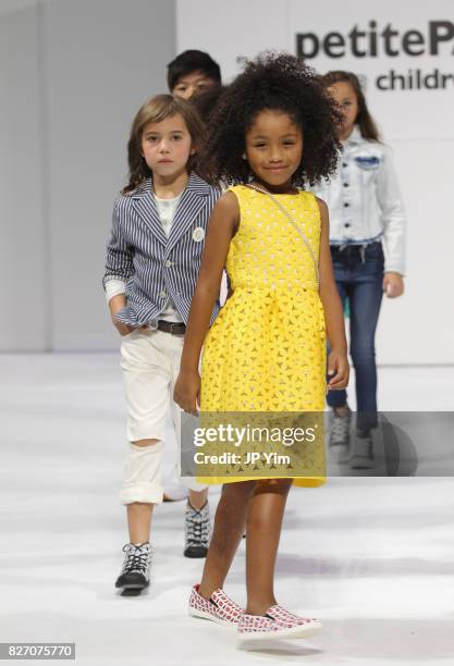 Young models walk the runway during the finale of petitePARADE at Children's Club at Jacob Javitz Center on August 6, 2017 in New York City.