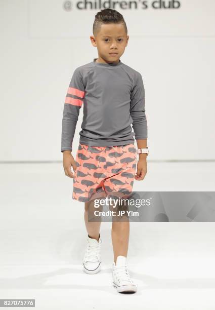 Young model walks the runway for Snapper Rock collection during petitePARADE at Children's Club at Jacob Javitz Center on August 6, 2017 in New York...