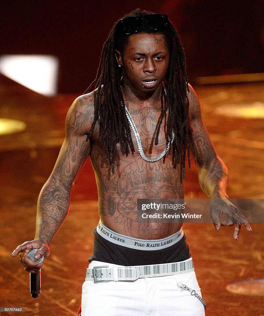 Famous Rapper In 2008 Rapper Lil Wayne performs on stage at the 2008 MTV Video Music Awards ...