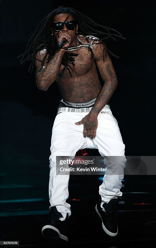 Famous Rapper In 2008 Rapper Lil Wayne performs on stage at the 2008 MTV Video Music Awards ...