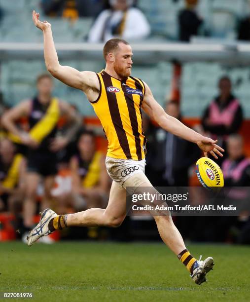 Jarryd Roughead of the Hawks kicks the ball in his 250th game during the 2017 AFL round 20 match between the Richmond Tigers and the Hawthorn Hawks...