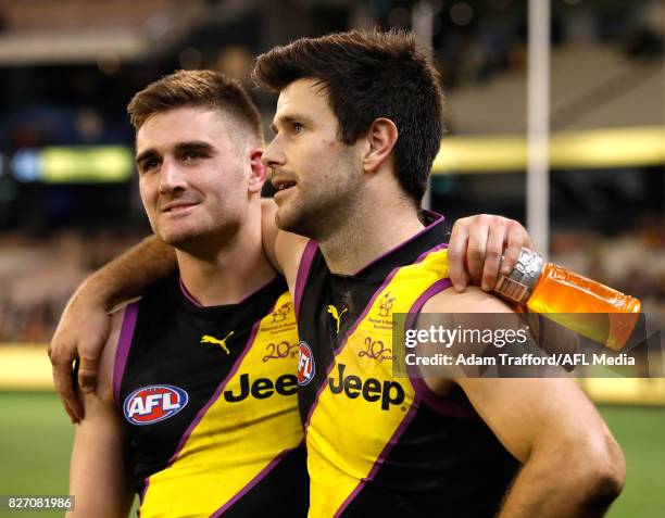 Trent Cotchin of the Tigers celebrates with Anthony Miles of the Tigers during the 2017 AFL round 20 match between the Richmond Tigers and the...