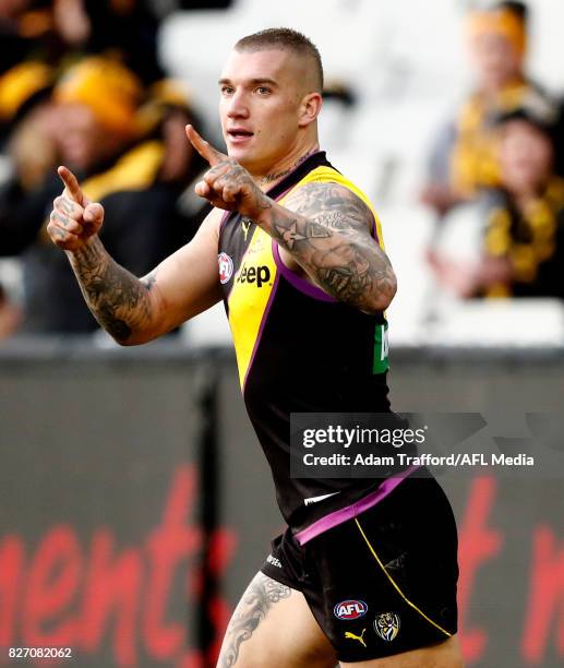 Dustin Martin of the Tigers celebrates a goal during the 2017 AFL round 20 match between the Richmond Tigers and the Hawthorn Hawks at the Melbourne...