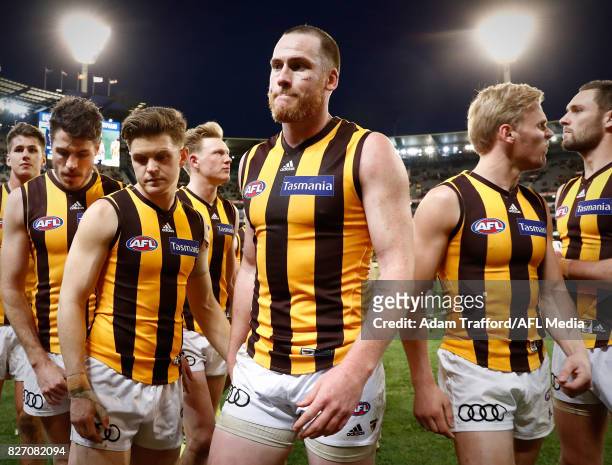 Jarryd Roughead of the Hawks leads the team off after his 250th game during the 2017 AFL round 20 match between the Richmond Tigers and the Hawthorn...