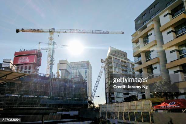 Collapsed crane is seen leaning on an apartment buliding at Wolli Creek on August 7, 2017 in Sydney, Australia. Around 200 people have been unable to...