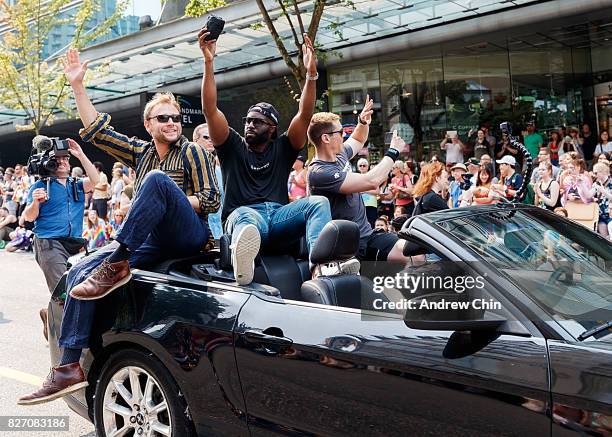 Netflix's Sense8 cast members Max Riemelt, Toby Onwumere and Brian J. Smith attend Vancouver Pride Parade on August 6, 2017 in Vancouver, Canada.