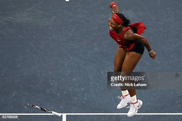 Serena Williams of the United States celebrates winning championship point against Jelena Jankovic of Serbia during the women's singles finals on Day...