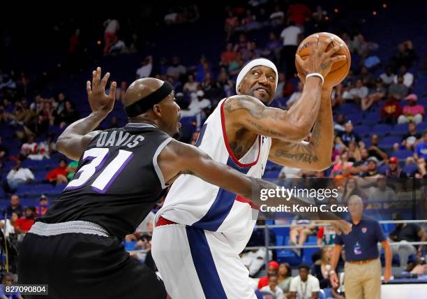 Dominic McGuire of Tri-State is guarded by Ricky Davis of Ghost Ballers during week seven of the BIG3 three on three basketball leagueat Rupp Arena...