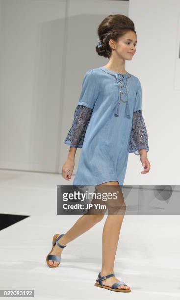Models walk the runway for Blu and Blue collection finale during petitePARADE at Children's Club at Jacob Javitz Center on August 6, 2017 in New York...