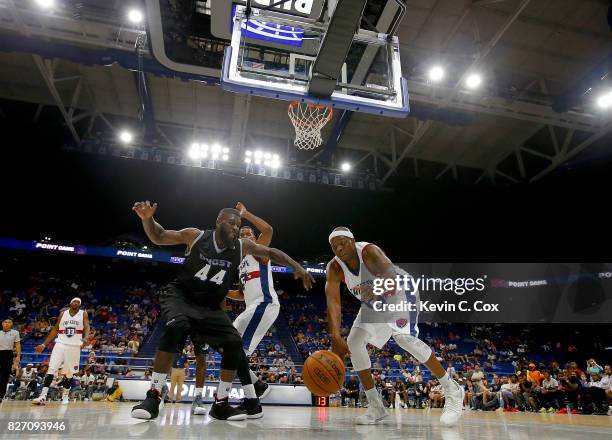 Bonzi Wells of Tri-State and Ivan Johnson of the Ghost Ballers dive for a rebound during week seven of the BIG3 three on three basketball league at...