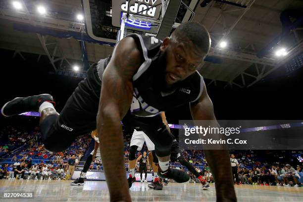 Ivan Johnson of the Ghost Ballers falls out of bounds while going for a rebound during the game against Tri-State during week seven of the BIG3 three...