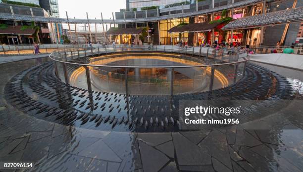 gae aulenti square, milan-italy - ambientazione esterna stock pictures, royalty-free photos & images