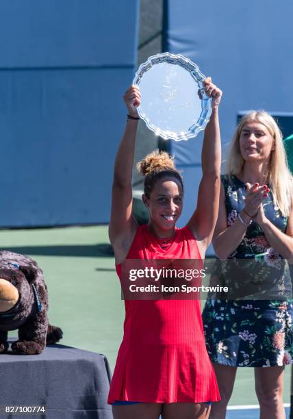 Madison Keys raises her winner's trophy during a WTA singles championship round at the Bank of the West Classic between at the Taube Family Tennis...