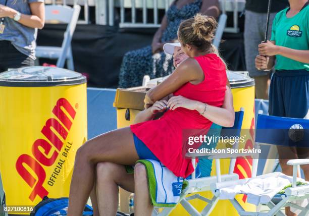 Madison Keys gives CoCo Vandeweghe a hug after the match at the WTA singles championship round at the Bank of the West Classic between at the Taube...