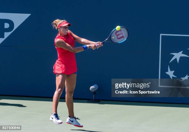 Madison Keys places a backhand return during a WTA singles championship round at the Bank of the West Classic between at the Taube Family Tennis...