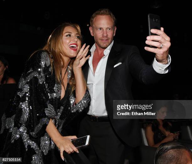 Actress Cassie Scerbo and actor Ian Ziering live-stream during the premiere of "Sharknado 5: Global Swarming" at The LINQ Hotel & Casino on August 6,...