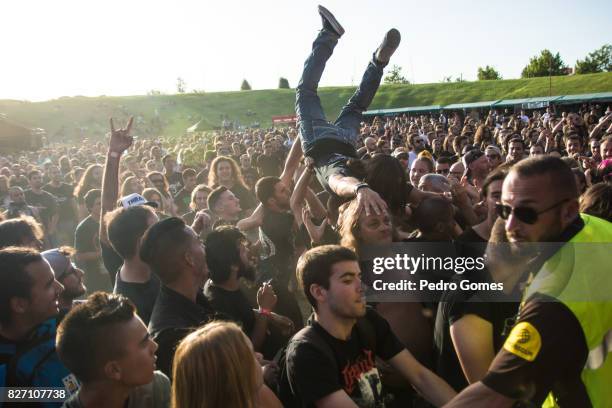 Fan crowdsurfs during Obituary performance at the VOA Festival at Quinta da Marialva on August 6, 2017 in Corroios, Portugal.
