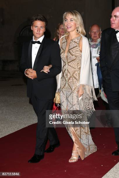Princess Gabriele zu Leiningen, her son Prince Aly Muhammad Aga Khan and Dr. Wolfgang Seybold attend the 'Aida' premiere during the Salzburg Opera...