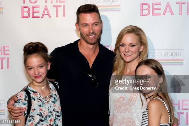 Actors Jayden Bartels, Eric Martsolf, Martha Madison and Avery Hewitt arrive for the "To The Beat" Special Screening at The Colony Theatre on August...