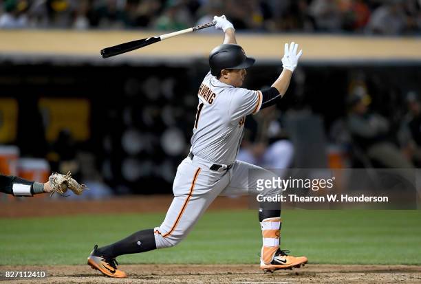 Jae-Gyun Hwang of the San Francisco Giants bats against the Oakland Athletics in the top of the fifth inning at Oakland Alameda Coliseum on August 1,...