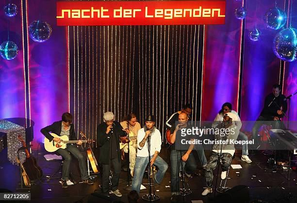 The Soehne Mannheims and Xavier Naidoo sing during the Day of Legends gala night at the Schmitz Tivoli theatre on September 7, 2008 in Hamburg,...