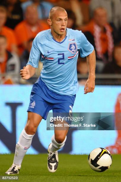 John Heitinga of Holland runs with the ball during the International friendly match between Holland and Australia at the Phillips Stadium on...