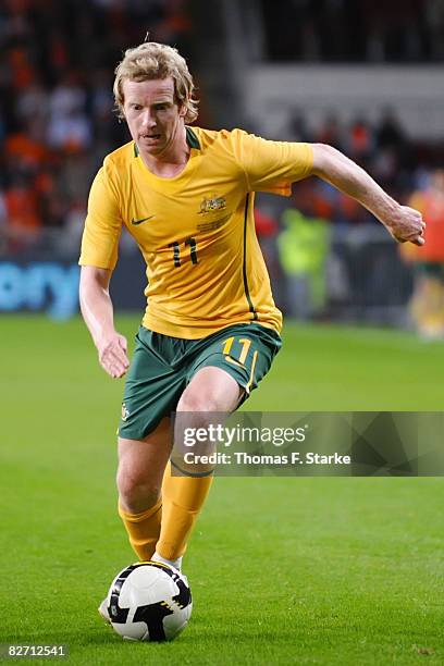 David Carney of Australia runs with the ball during the International friendly match between Holland and Australia at the Phillips Stadium on...