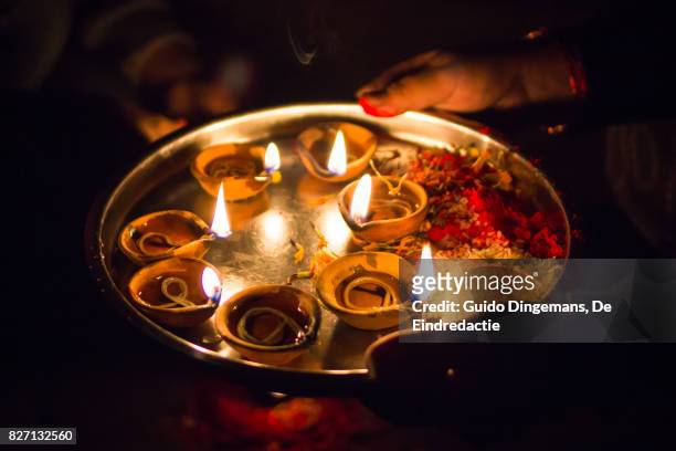 oil lamps during lakshmi puja, festival of lights (kathmandu, nepal) - nepal road stock pictures, royalty-free photos & images