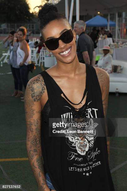 Actress AzMarie Livingston attends Athletes vs. Cancer's Celebrity Flag Football Game at John Burroughs High School on August 6, 2017 in Burbank,...
