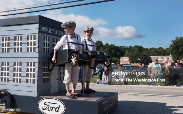 Caleb and Matthew Paddock of Deaborn, Michigan participate in the Twin Days Double Take Parade which kicks off the Twin Days Festival 2017 in...