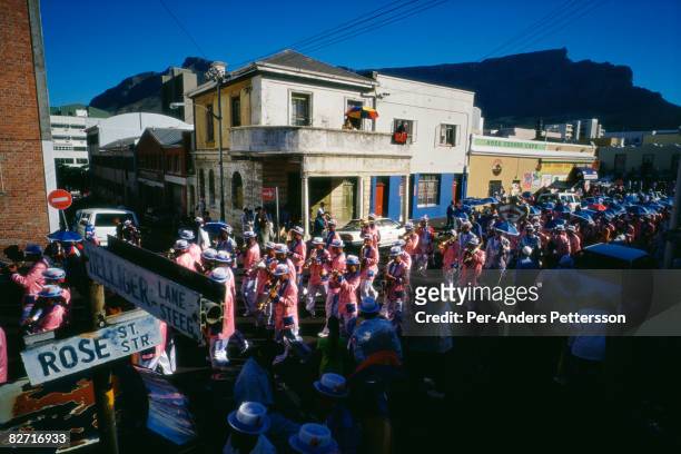 marching band performs in bo-kaap, cape  - cape town carnival in south africa stock pictures, royalty-free photos & images