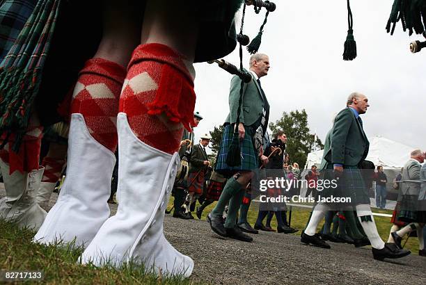 Pipers play during the opening parade at the Annual Braemar Highland Gathering on September 6, 2008 in Braemar, Scotland. The Braemar Gathering is...