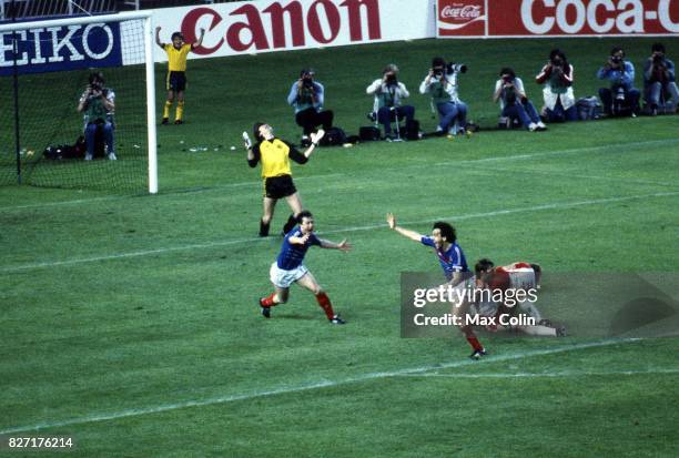 Michel Platini of France celebrates scoring his goal during the European Championship match between France and Denmark at Parc des Princes, Paris,...