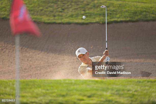 golfer hitting out of bunker or sand trap. - golf bunker fotografías e imágenes de stock