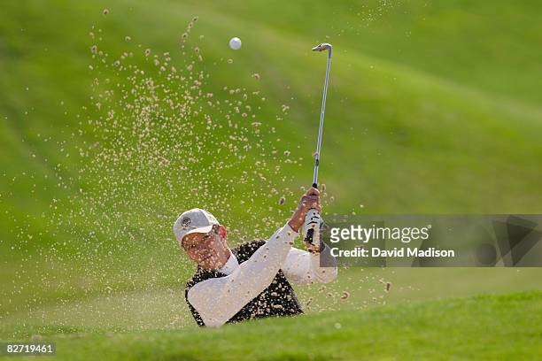 golfer hitting out of bunker or sand trap. - golf bunker fotografías e imágenes de stock