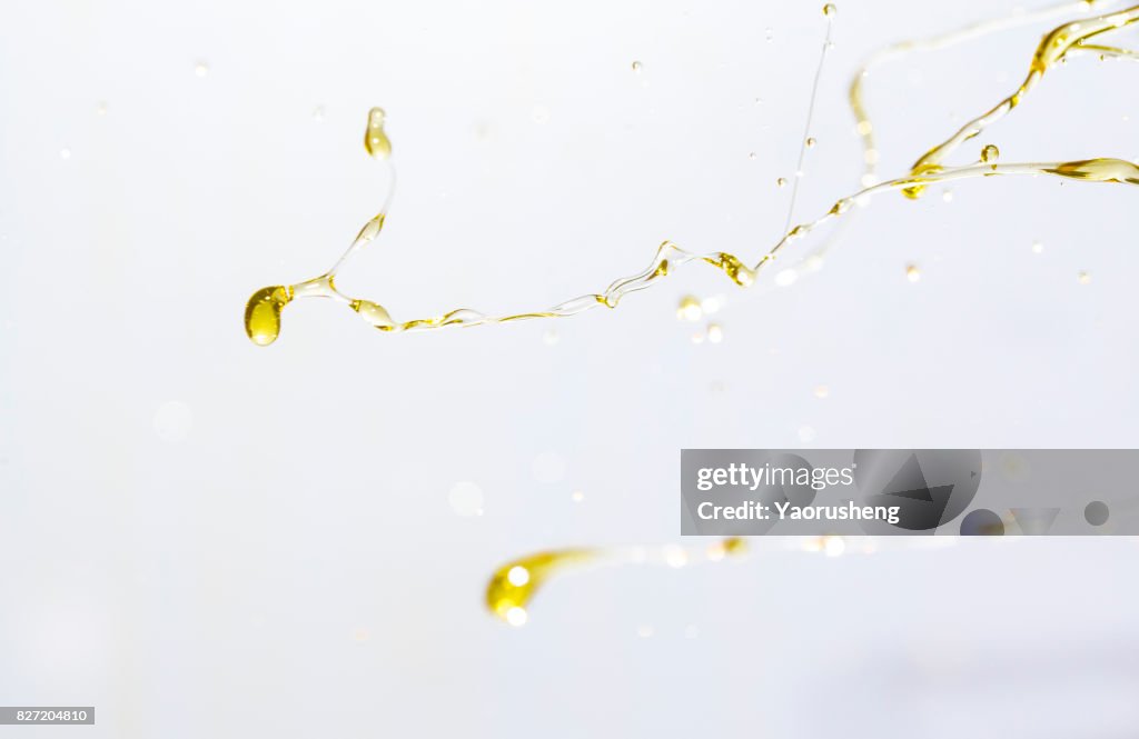 Active oil splash in white background