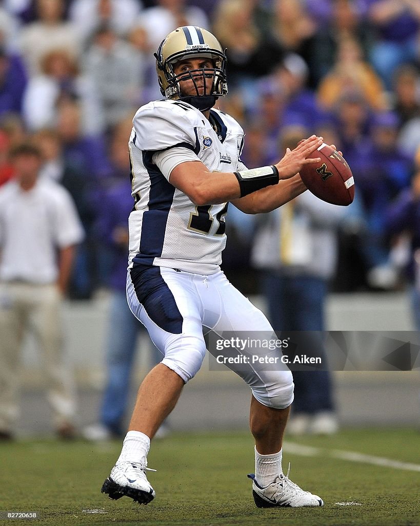 Kempt Quarterback Cody Kempt of the Montana State Bobcats looks down field ...