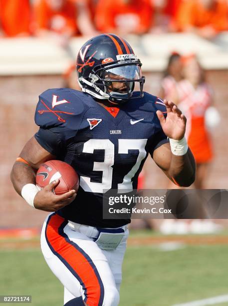 Cedric Peerman of the Virginia Cavaliers carries the ball during the game against the Southern California Trojans at Scott Stadium on August 30, 2008...