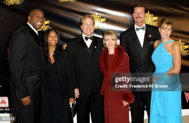 Former NBA star Earvin "Magic" Johnson and his wife Cookie, baseball pitcher Curt Schilling and his wife Shonda and baseball pitchcer Randy Johnson...