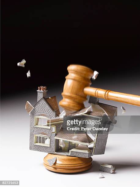 gavel smashing down on house - peter law foto e immagini stock