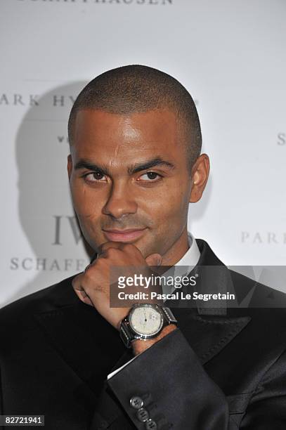 Tony Parker poses with an IWC watch during the IWC Schaffhausen Party at the Park Hyatt Paris Vendome, on September 08, 2008 in Paris, France.