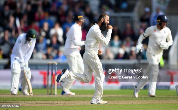 Moeen Ali of England celebrates dismissing Quinton de Kock of South Africa during day four of the 4th Investec Test match between England and South...
