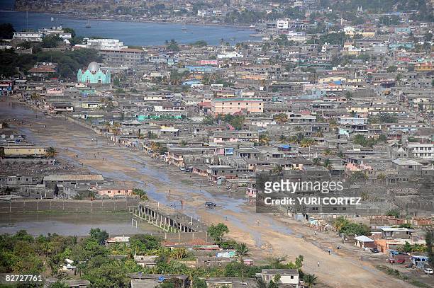 Aerial view of the damages by flooded in the city port of Port Spain close to city of Gonaives some 200 kilometres north of Port Au Prince on...