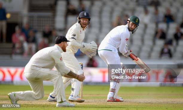South Africa batsman Theunis de Bruyn is caught by Ben Stokes at slip as Jonny Bairstow looks on during day four of the 4th Investec Test match...
