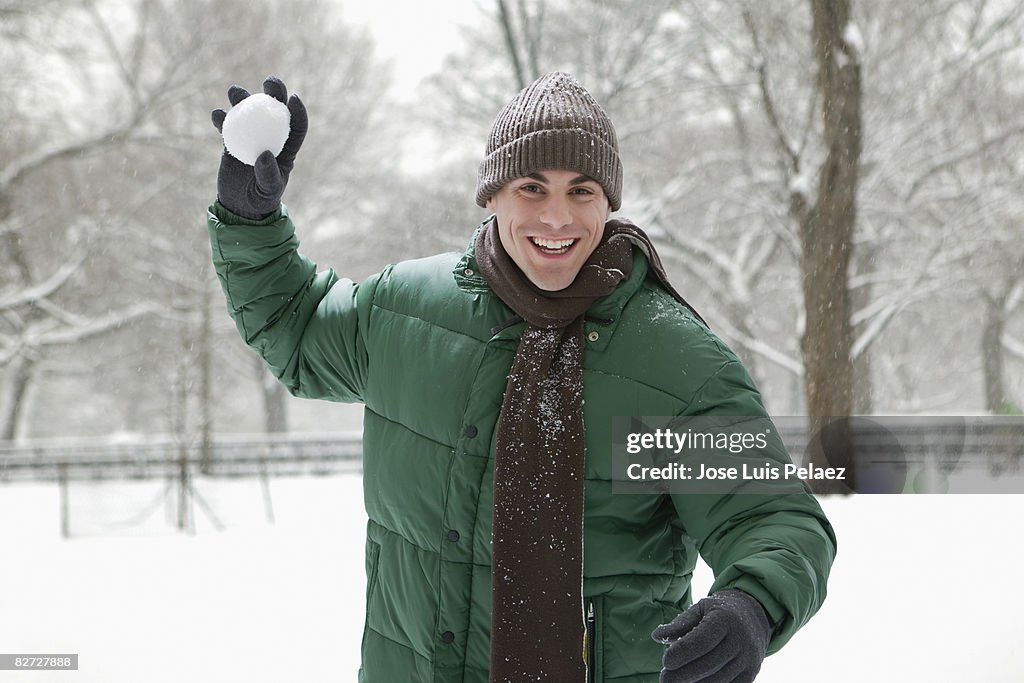 Young man about to throw snowball